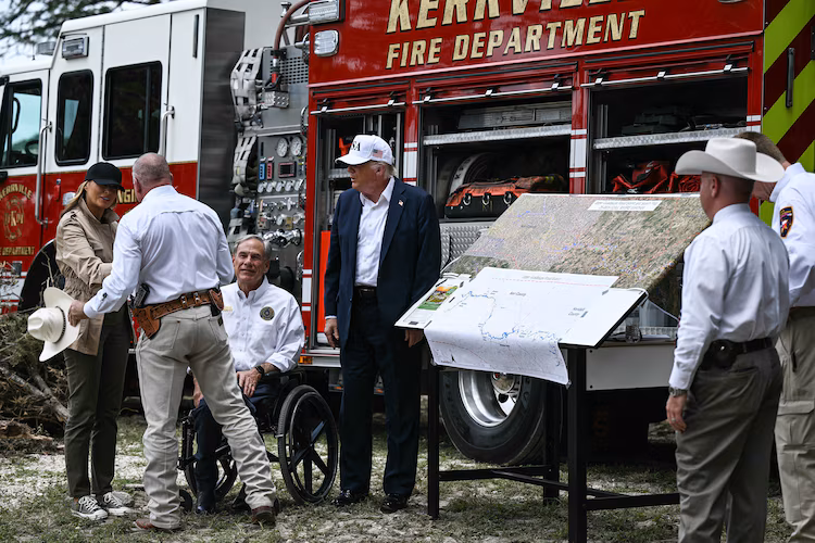 Trump tours Texas flood devastation while avoiding criticism he’s heaped on other governors